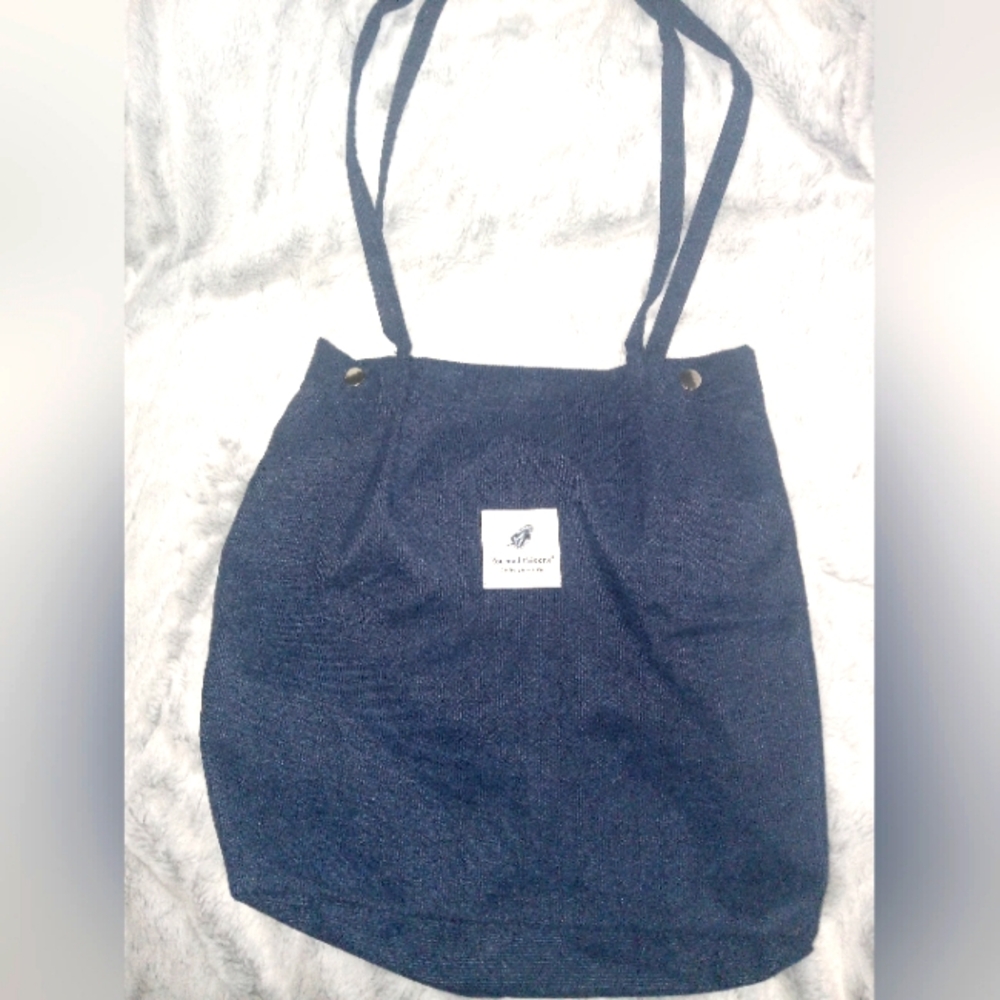Navy Blue Backpack with Sturdy Canvas Material and Classic Shape